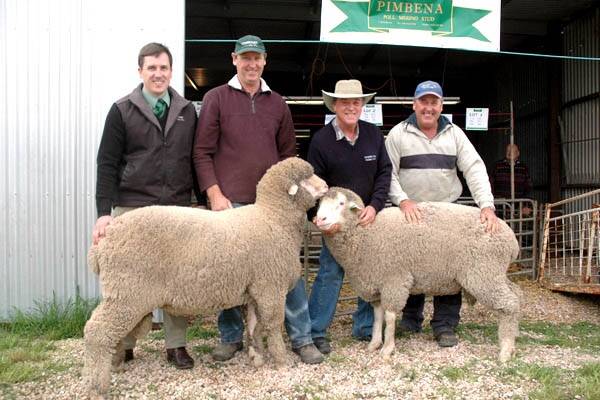TOP RAMS: Landmark wool manager Adrian Dewell, buyers Mike Baldock, Hasslam and Trevor Pittaway, Wirrulla, and Pimbena studmaster Les Hamence (centre) with two of three top rams which sold for $2000. 