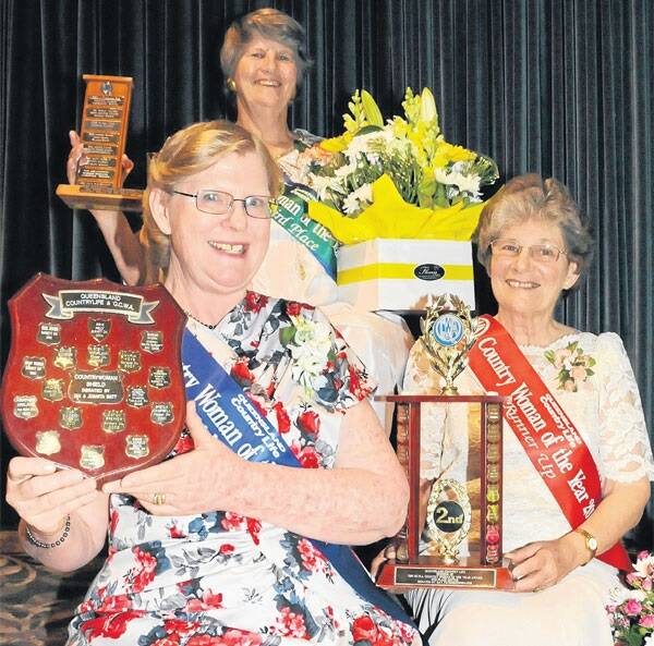 2012 Country Woman of theYear winner Susan Gale, Maranoa Division, with second place winner Rosemary Peterson, Border Division, and third place winner Katrina van den Brenk, Gympie and South Burnett Division, at the gala conference dinner in Toowoomba on Tuesday night.