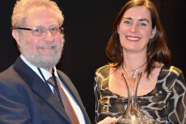 Kate Harvey, Acting Executive Director GWRDC, presents Dr Victor Sadras with the Australian Society of Viticulture and Oenology SA award for best viticulture paper 2012 for “research with significant potential application to industry”.  PHOTO COURTESY ASVO 