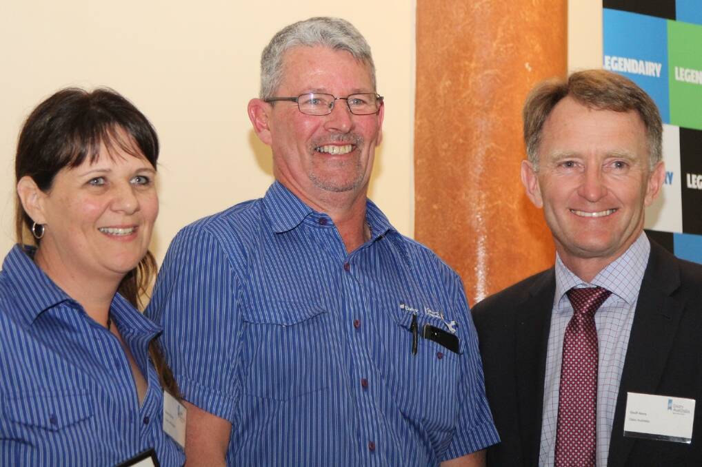 Founders of Cows Create Careers, Deanne Kennedy and John Hutchinson, are congratulated by Dairy Australia chairman Geoff Akers.