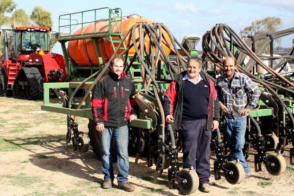 Boekeman Machinery service manager James Gulliver (left), salesman Steve Darrah and Konnongorring farmer Jamie Bynon.