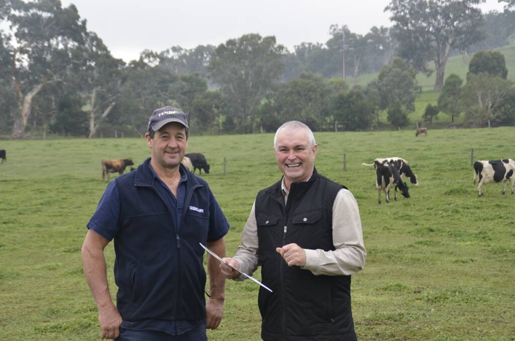 Mount Torrens dairyfarmer Rick Gladigau and Landcare SA chairman Gerry Butler.