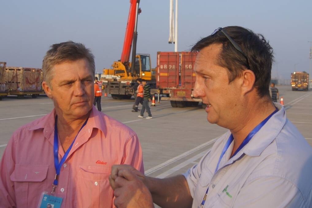 Elders International sales manager David O'Hare and Global Compliance Director and founder Brian Scott in China last month when the air-shipment of Australian live slaughter ready cattle landed at Chongqing.