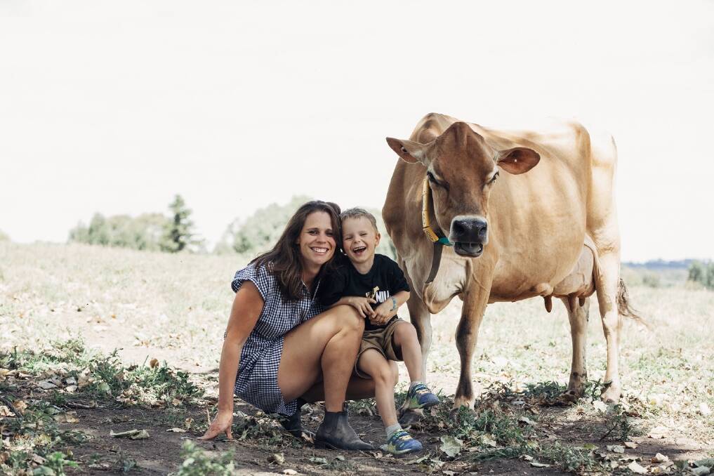 Sallie Jones and son Max. Sallie and dairy farmer Steve Ronalds founded Gippsland Jersey and have built kindness and fairness into their business model.
