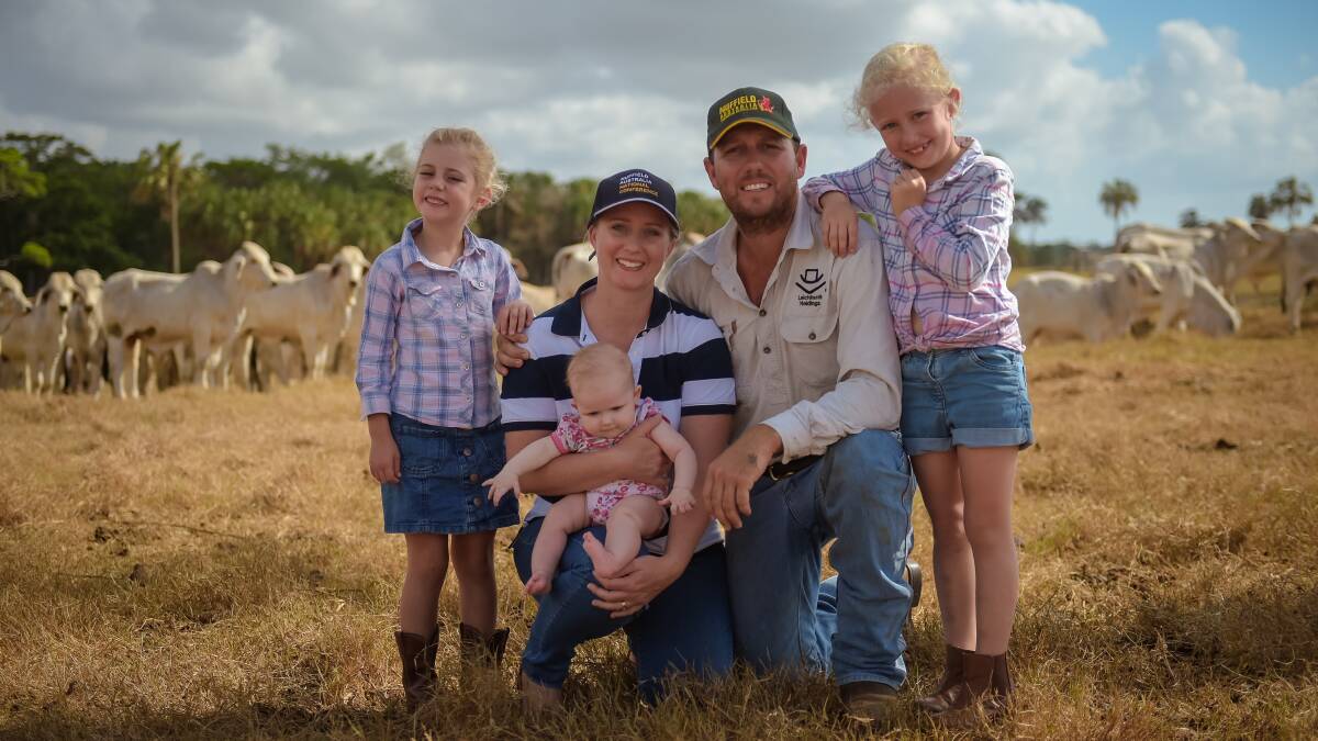 Sarah and Stewart Borg and their three daughters, Chelsea, 7 (right), Madelyn, 5 (left), and Heidi, 6 months. The family run a cattle and cane operation at Marklands on 2630ha with 1400 grey Brahman breeders, and small stud herd of 200 breeders, with about 2500 head on the property. Photo - Kelly Butterworth. 