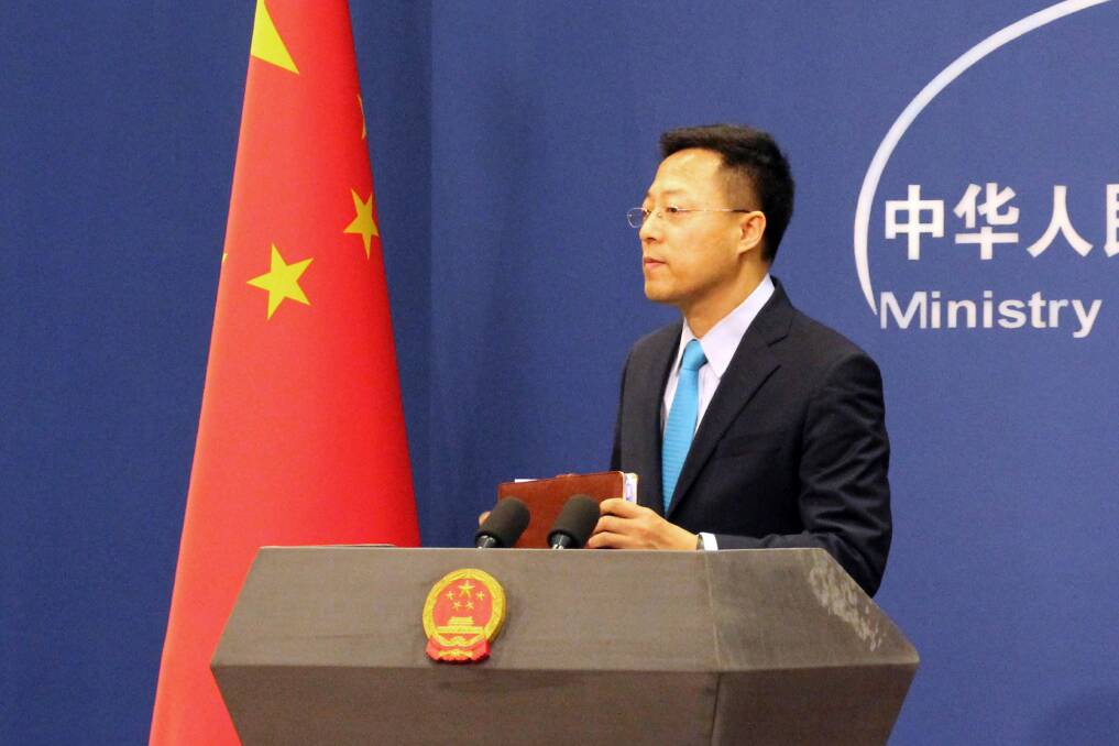 Chinese Foreign Ministry spokesman Zhao Lijian has pinned the tweet which sparked a diplomatic row to the top of his Twitter profile page. Picture: Getty Images