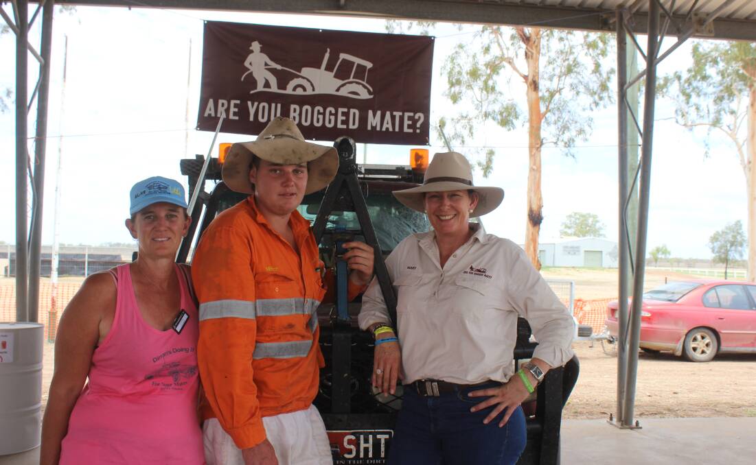 Carrie Smart with her son Mitch, and 'Are you Bogged Mate?' founder Mary O'Brien at the Dirranbandi Ute Muster last Saturday. Picture - Helen Walker
