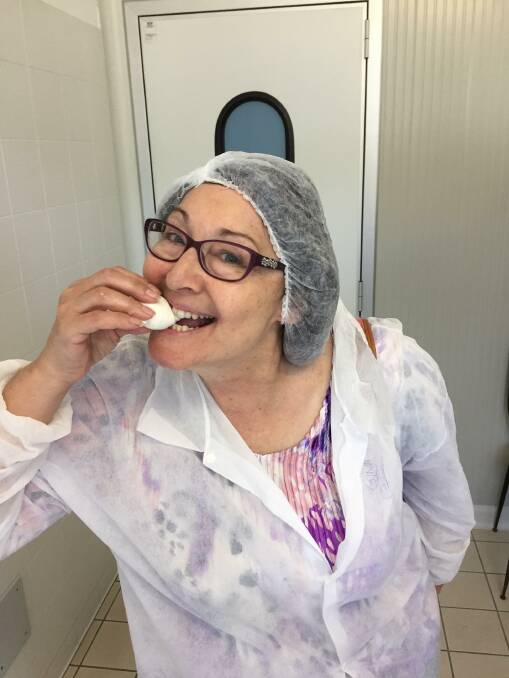 Gina Dal Santo tasting fresh mozzarella in Italy. Picture supplied.
