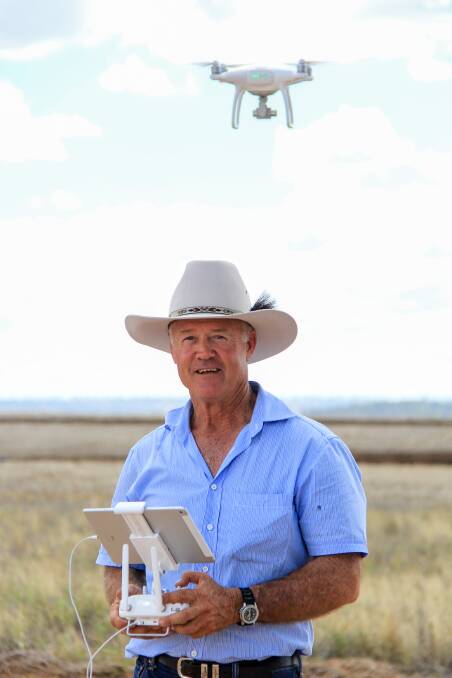 Gavin Burey with his Phantom 4 drone he has been using to muster and check waters. 