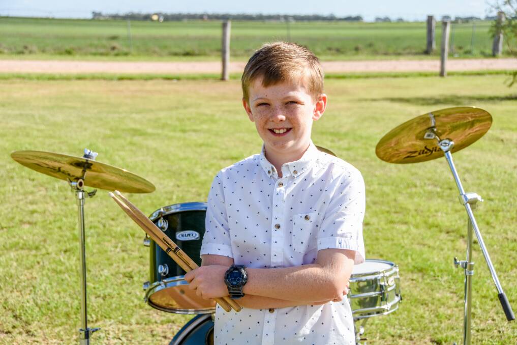 Grant doesn't mind if he played drums in a band or the orchestra when he grows up, as long as he can play!