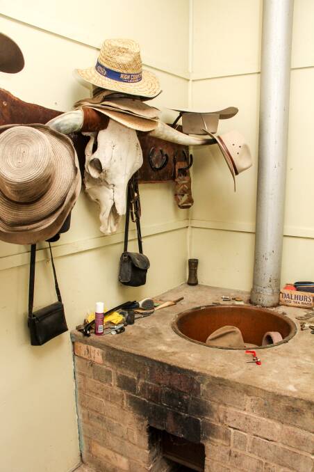 A signature cow horn hat rack and laundry copper in the home. 