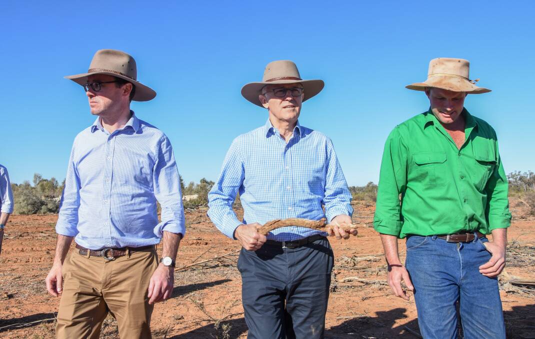 Agriculture Minister David Littleproud with Prime Minister Malcolm Turnbull at the Charleville property of Cameron Tickell on Tuesday. Pictures: Lucy Kinbacher
