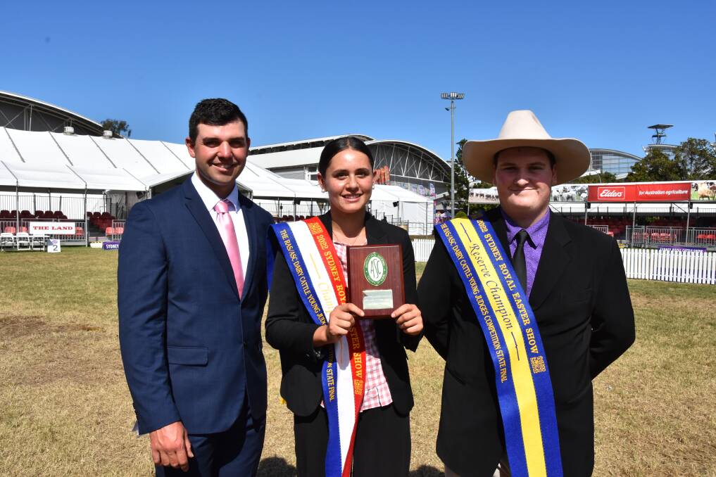 RAS/ASC Young Judges Dairy State Final judge Cameron Yarnold, Wingham, with winner Elly Simms, Numbaa, and reserve champion Lachlan Moore from Taree.