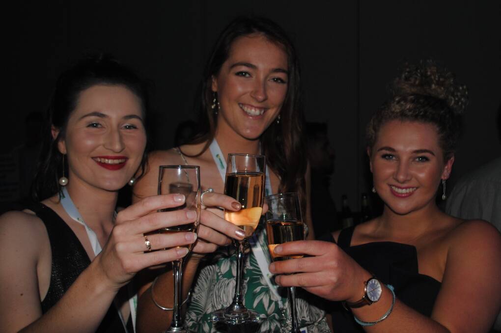 BEEFEX: Louise Rush, UQ Gatton, Mariah Walker, CSU, Wagga, and Ruby Canning, UNE, Armidale celebrating at the BeefEx gala dinner.