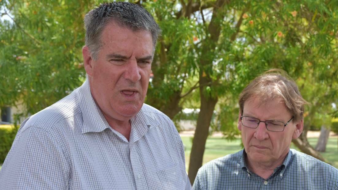 Agriculture Minister Mark Furner and Professor Peter Coaldrake announcing the closure of the Longreach and Emerald agricultural training colleges.