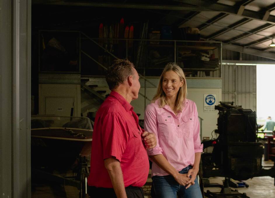 Rural Aid Mates Day Ambassador Laura Geitz talks with Brendan Dipple at his farm in the Lockyer Valley. Picture supplied