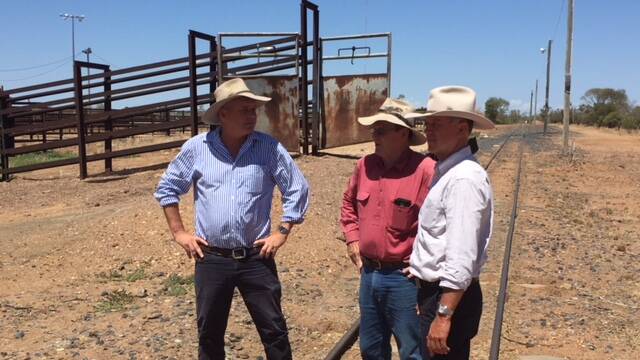 Longreach Regional Council's Cr Trevor Smith (centre) with Member for Gregory, Lachlan Millar, with and opposition agriculture spokesman Tony Perrett talking about development opportunities for the Longreach Saleyards.