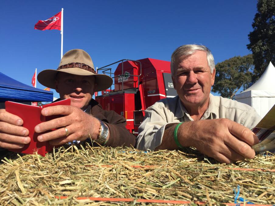 BALE BARONS: Rob Collman and Graham Lutten, Southern Downs Ag, Warwick, with the Bale Baron.