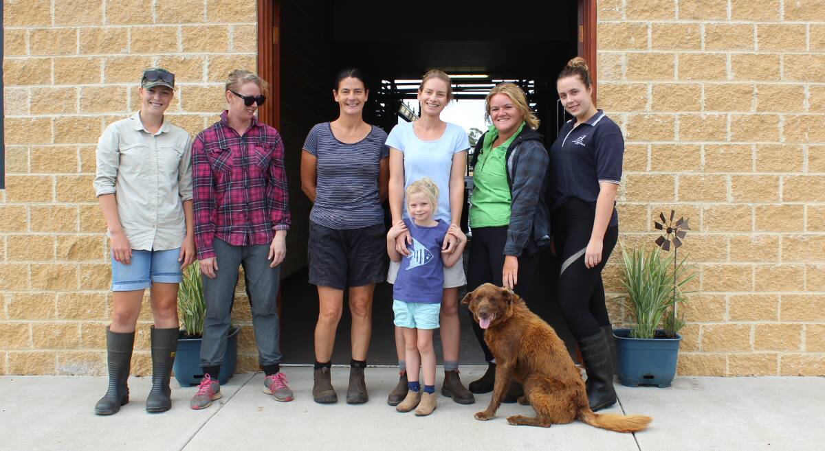 Elgin Dairies all-women workforce, Phoebe McConnell, Lianna Clapp, Sharon Merritt, Natalie Merritt with daughter Sadie, 4, Ellie Smyth and Hannah Jade with Bruce the dog outside the $2 million dairy.