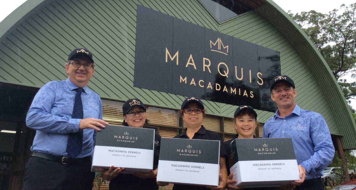 Marquis Macadamias chief executive officer Larry McHugh and chief operating officer Steven Lee and staff members May Hall, Alma Crawford and Dorrie Constant. 
