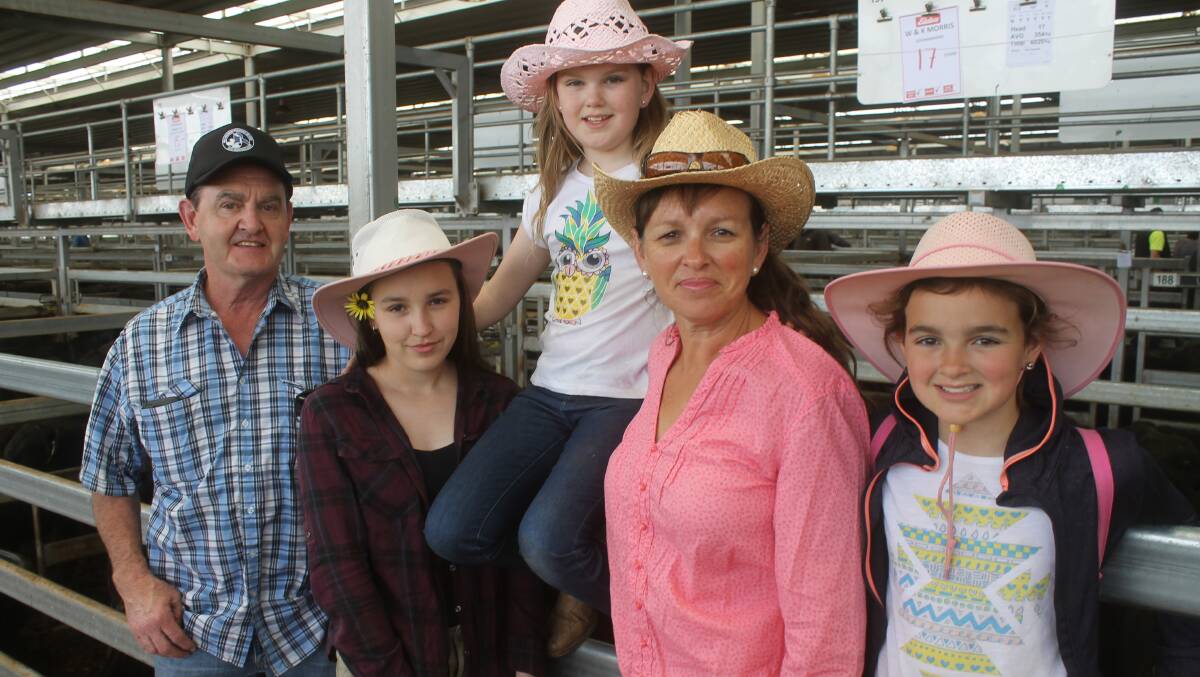 The Morris family from Gooramadda, with dad Anthony mum, Julie and daughters Emma Daisty and Eve sold Angus steers at the Barnawartha sale