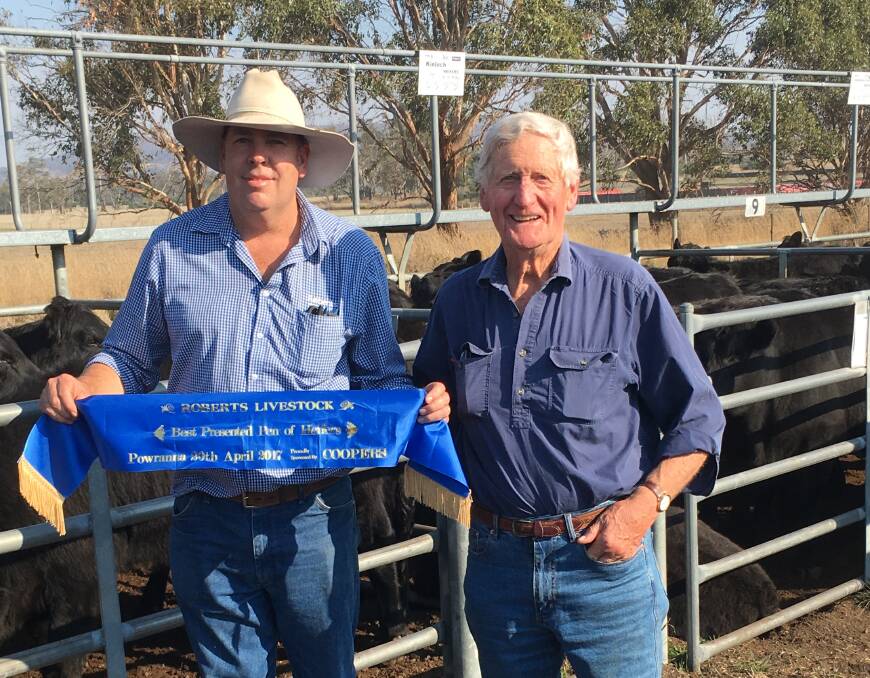 Roberts Limited Warren Johnson congratulated Nigel Campbell, Wannamadda on his Kinlock Angus draft that were judged the best presented heifers. 