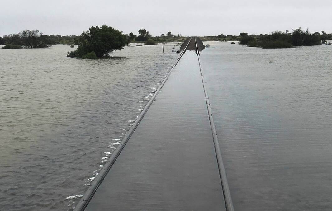 The flooded Trans-Australia Railway. Pictures: ARTC.